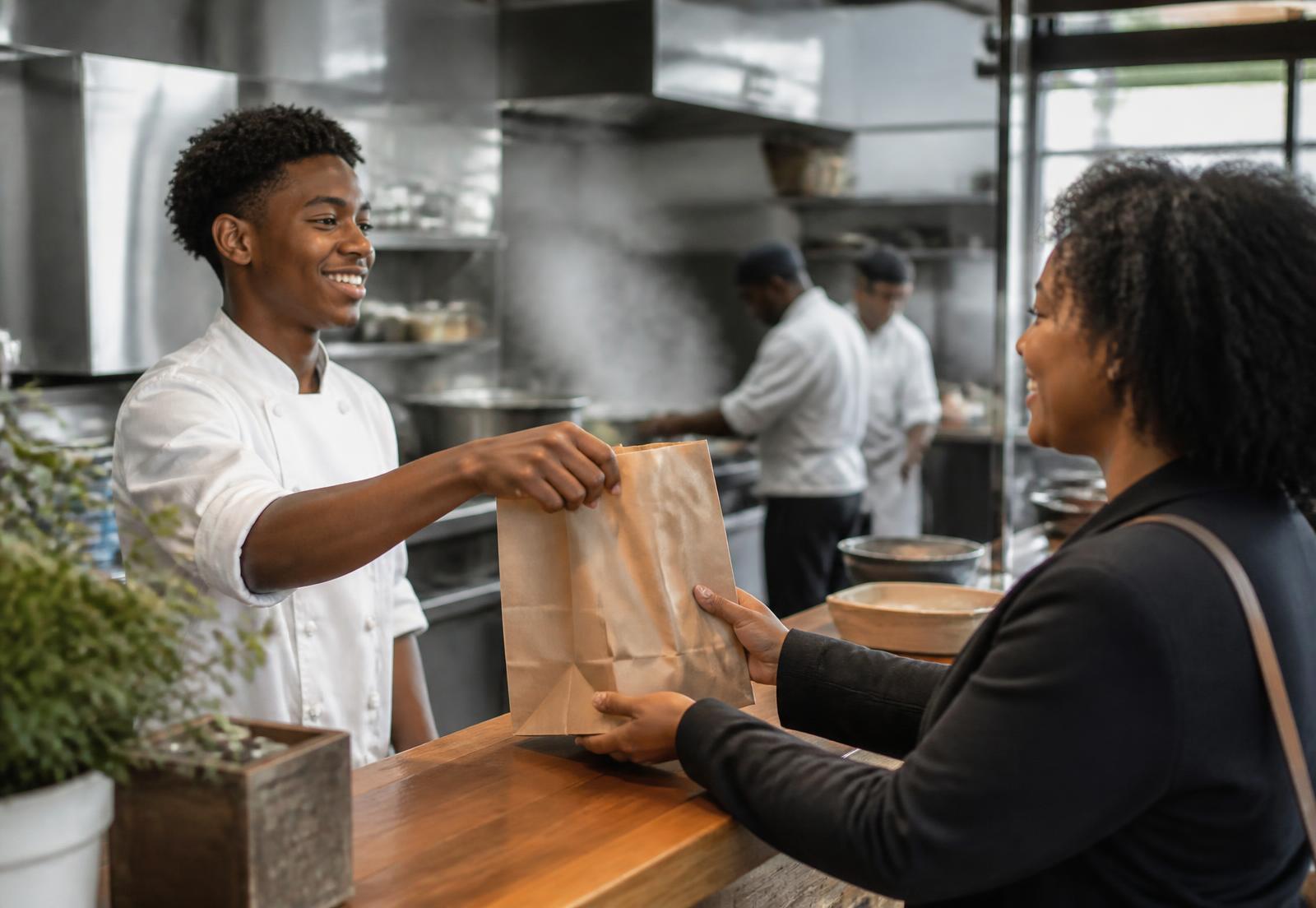 The pass inside a working restaurant kitchen